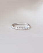 Sterling silver studded stacking ring with small diamond accents, designed by Sami Jewels.