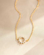 sunburst charm bracelet in gold 