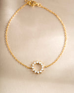 sunburst charm bracelet in gold closeup view