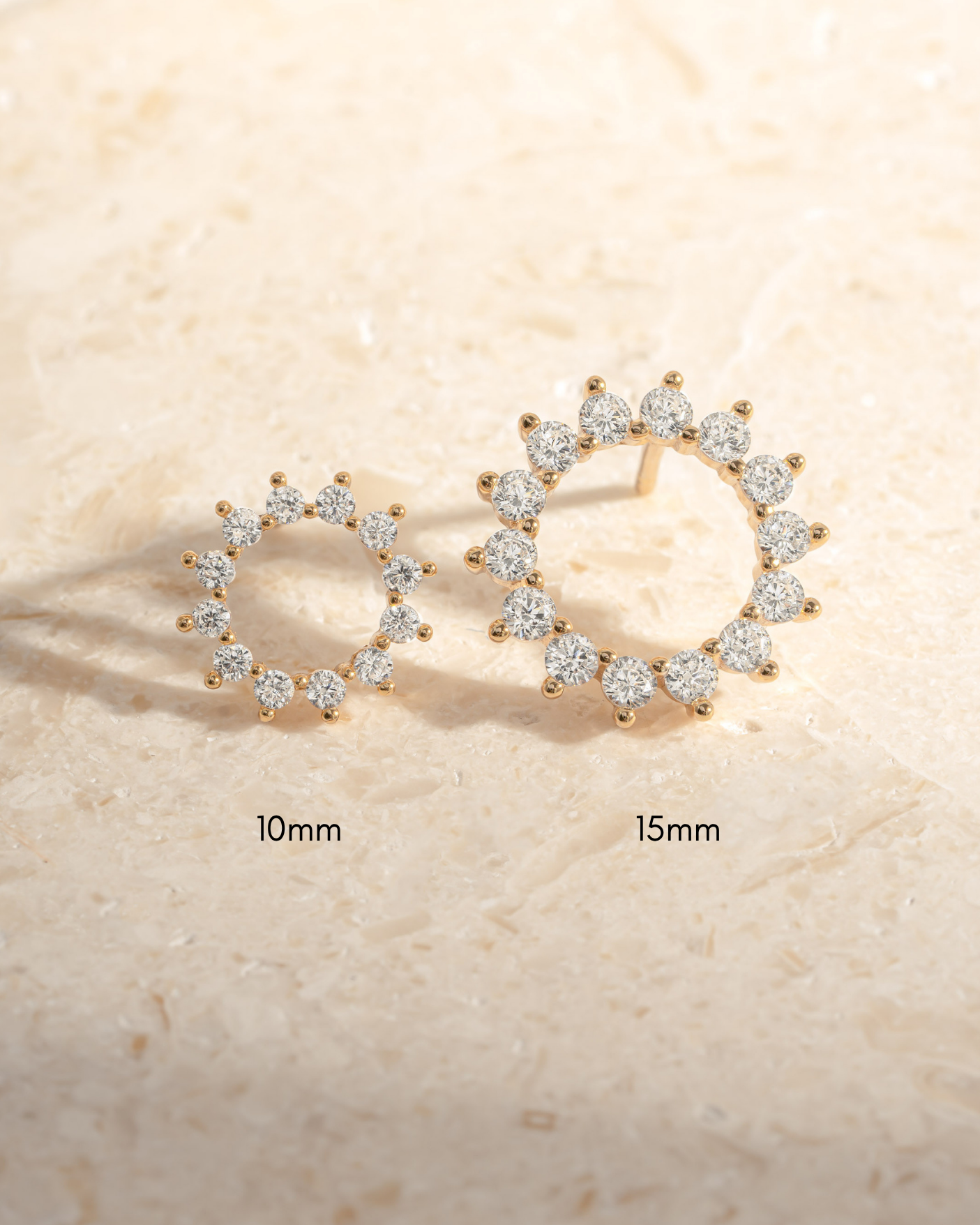 Sami Jewels 15mm sunburst diamond studs earrings featuring radiant sunburst design and sparkling diamonds.