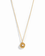 Gold Sunburst Medallion Necklace from Sami Jewels featuring a detailed sunburst pendant on a chain.
