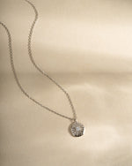 Sterling silver Sunburst Medallion Necklace by Sami Jewels showing front view with intricate sunburst design.