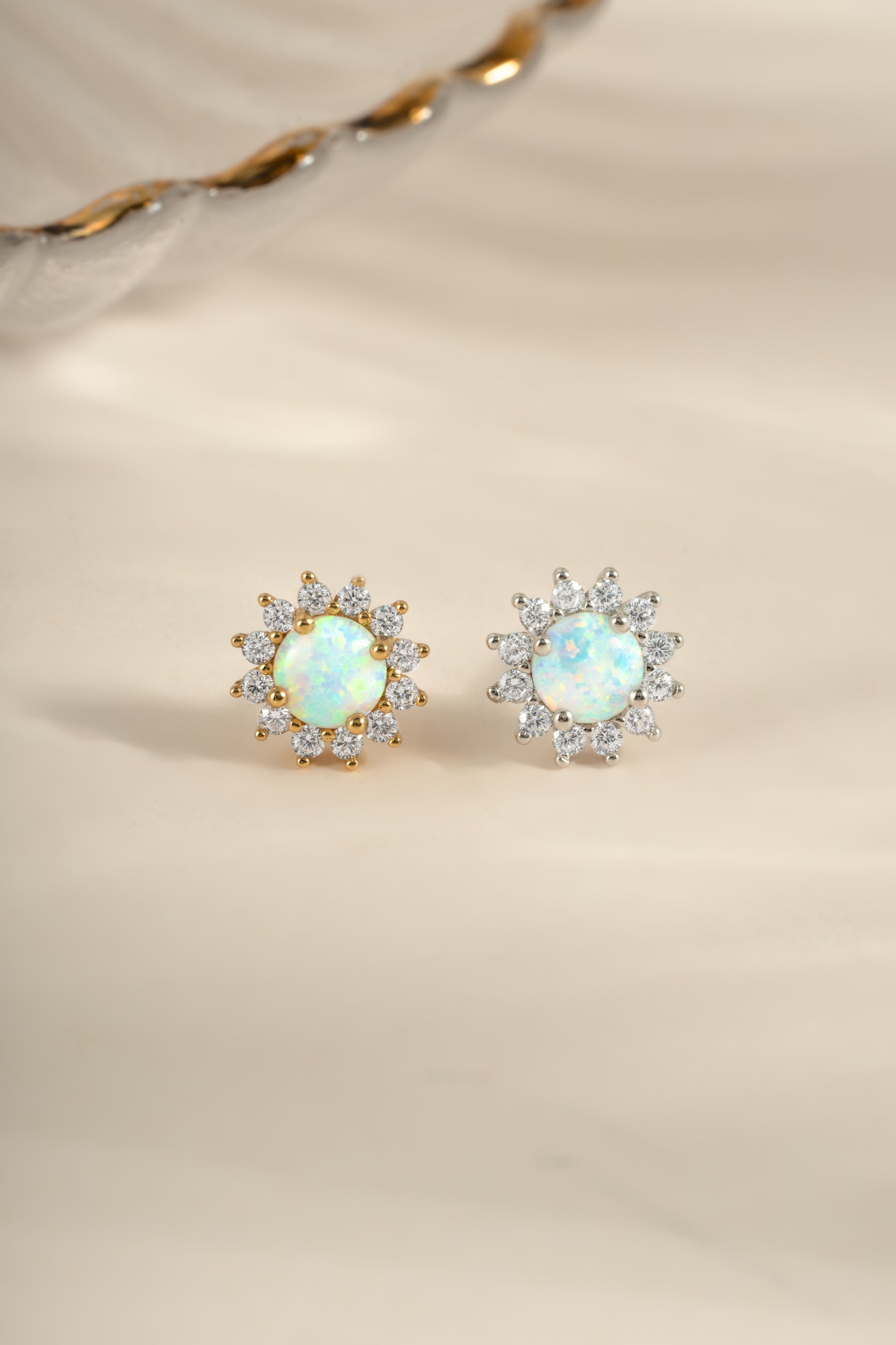 Gold and sterling silver Sunburst Opal Halo Stud Earrings by Sami Jewels featuring radiant opal centers and intricate halo design.