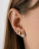 Gold Sunburst Opal Halo Stud Earrings by Sami Jewels featuring radiant opal center and intricate halo design.