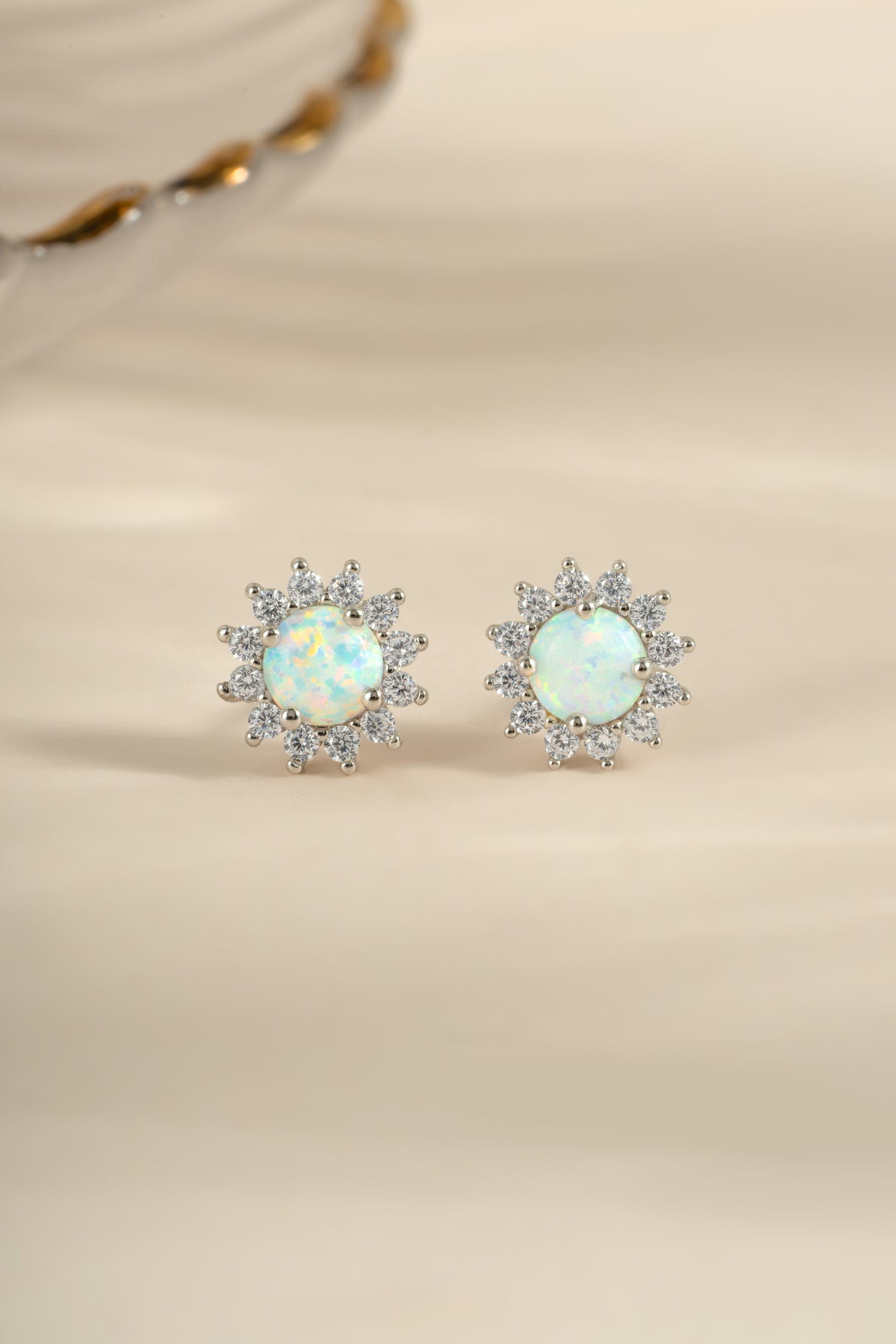 Sterling silver Sunburst Opal Halo Stud Earrings by Sami Jewels, showcasing vibrant opal gemstones with a halo design.