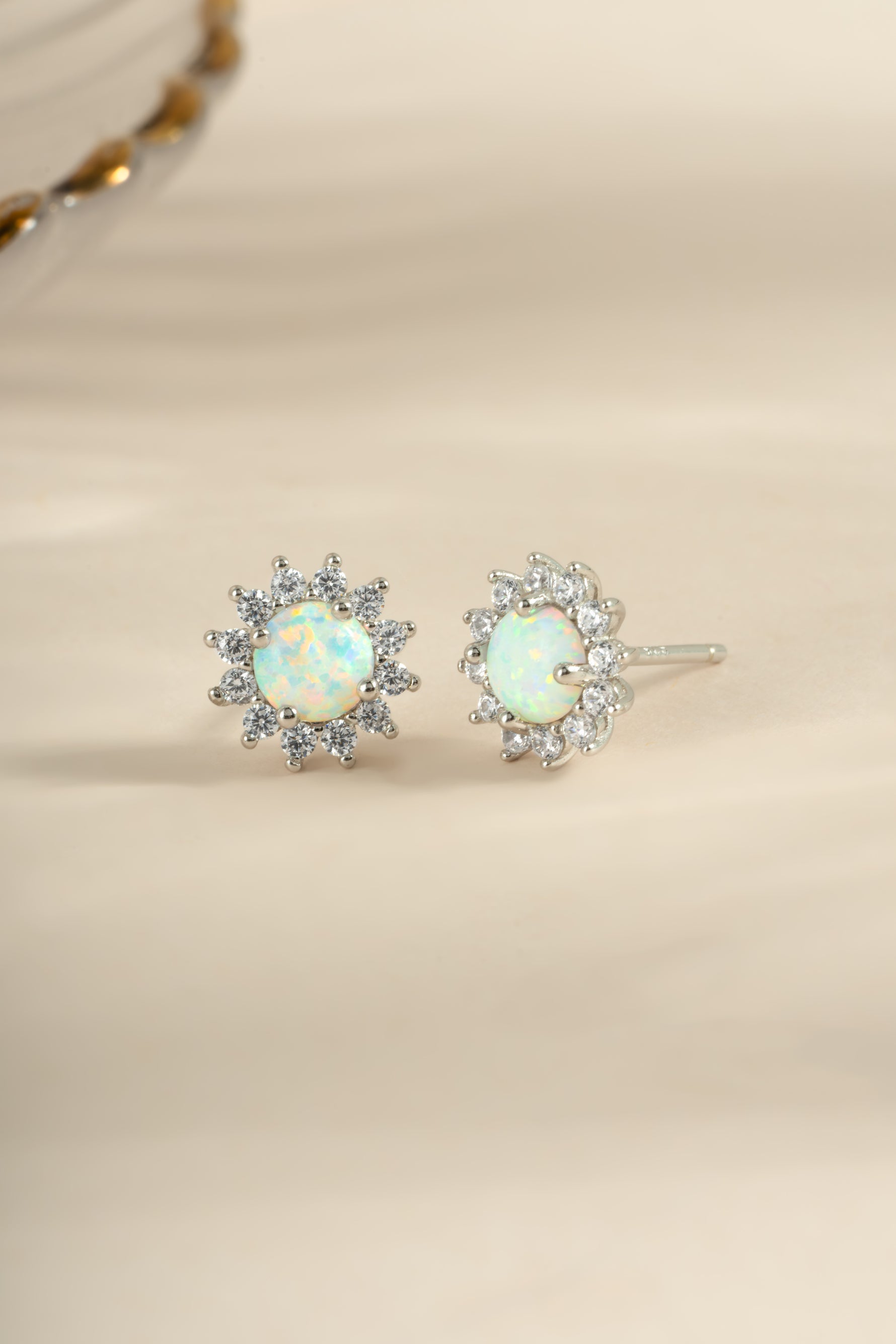 Sterling silver Sunburst Opal Halo Stud Earrings by Sami Jewels, featuring vibrant opal stones and intricate halo design.