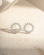 Sterling silver 15mm Sunburst Stud Earrings by Sami Jewels featuring a detailed sunburst design on each earring.