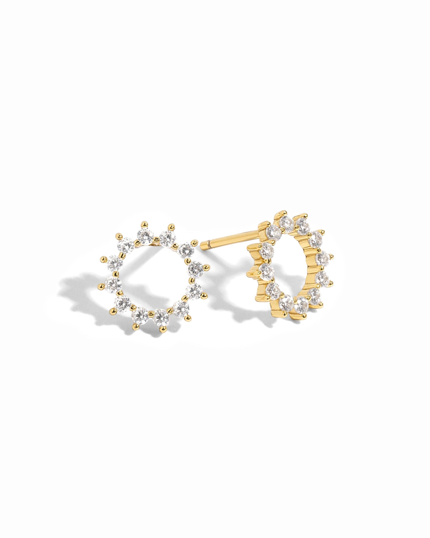 Gold Sunburst Stud Earrings by Sami Jewels with a bright, radiant design on a white background.