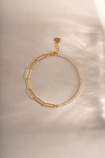 Gold Tennis and Paperclip Bracelet by Sami Jewels featuring sleek paperclip links and a tennis style design.
