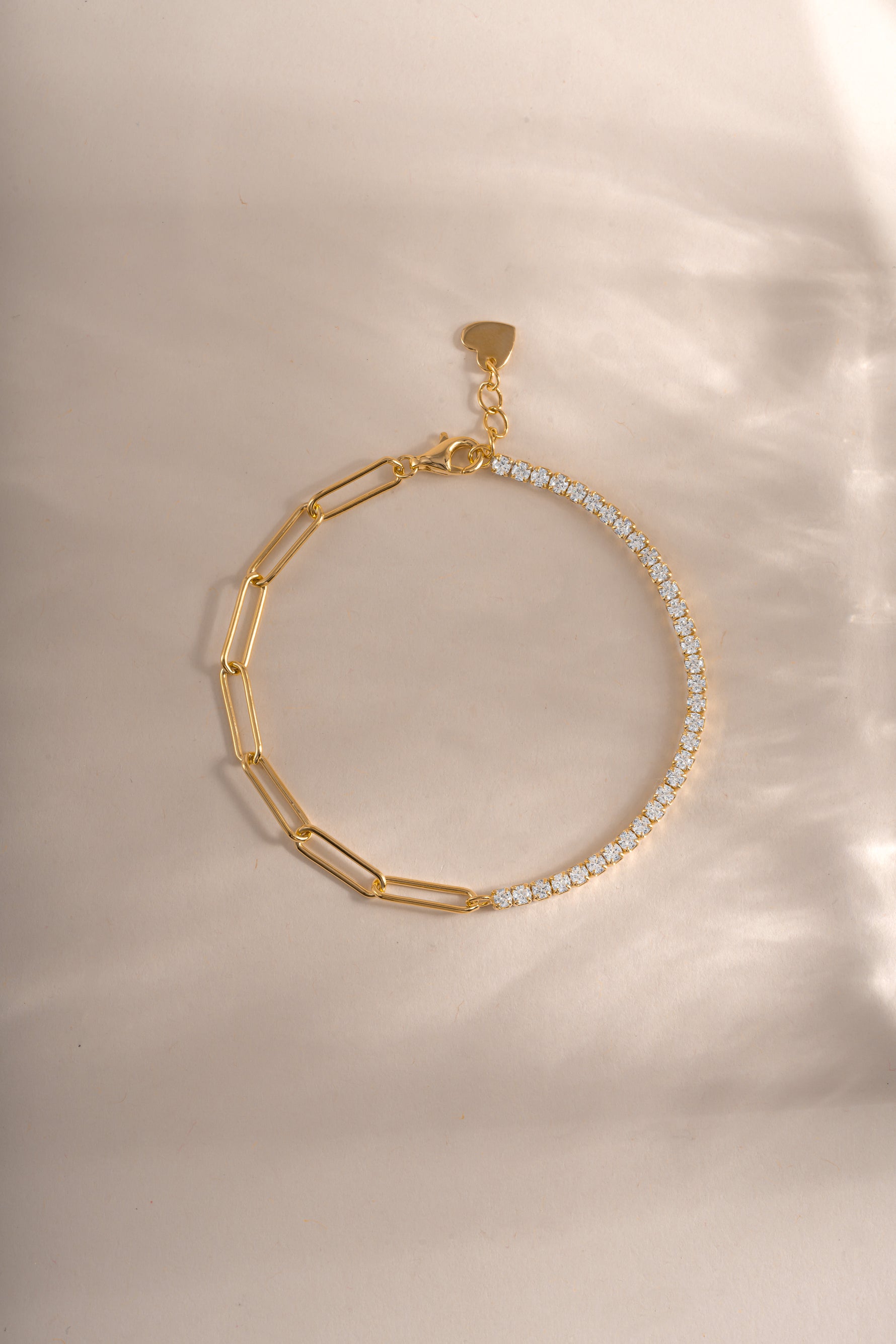 Gold Tennis and Paperclip Bracelet by Sami Jewels featuring sleek paperclip links and a tennis style design.