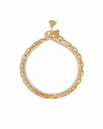 Gold tennis and paperclip bracelet set by Sami Jewels displayed on a white background, showcasing elegant jewelry design.