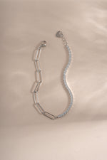 Close-up of Sami Jewels sterling silver tennis and paperclip bracelet set showing detailed links and shiny finish.