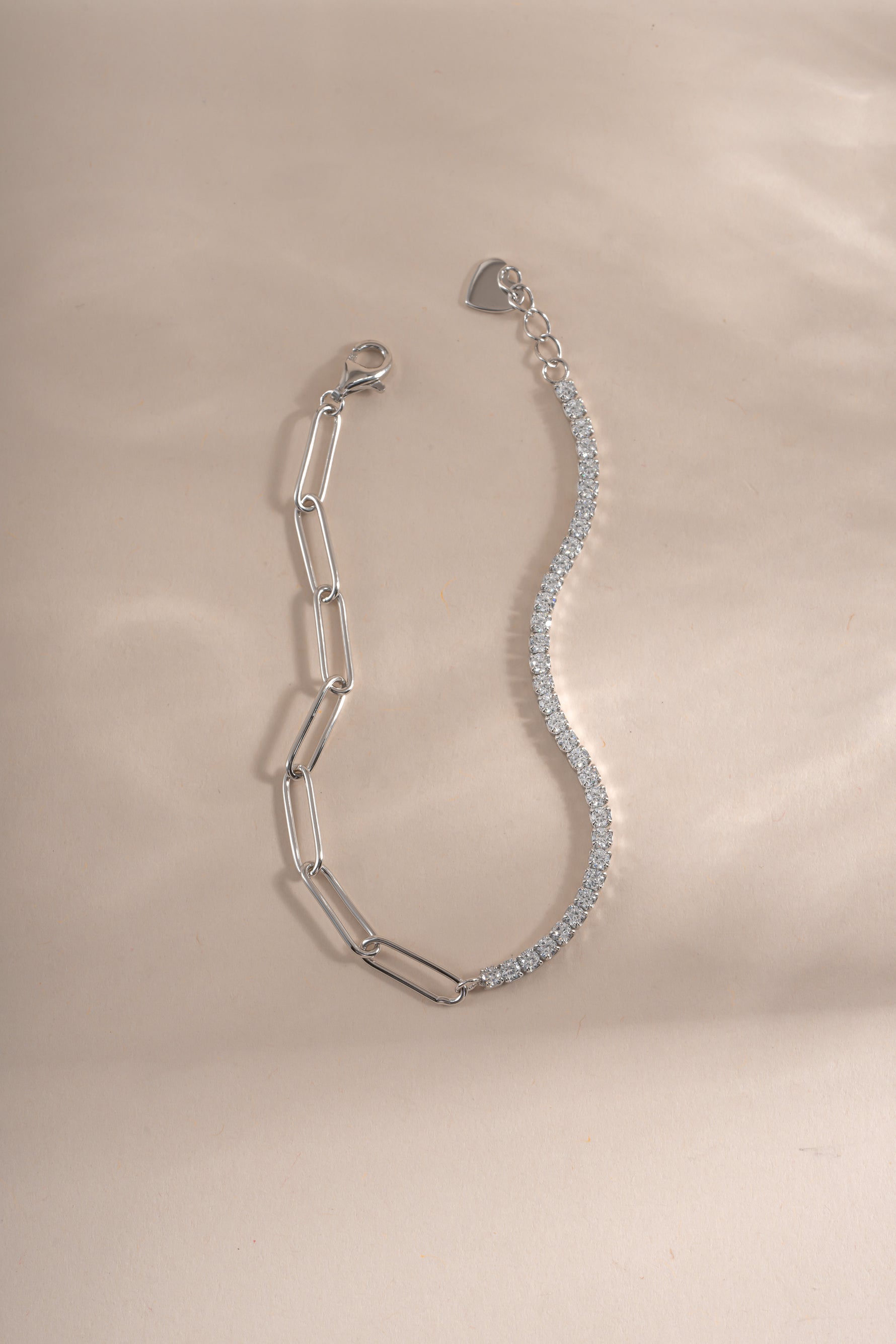 Close-up of Sami Jewels sterling silver tennis and paperclip bracelet set showing detailed links and shiny finish.