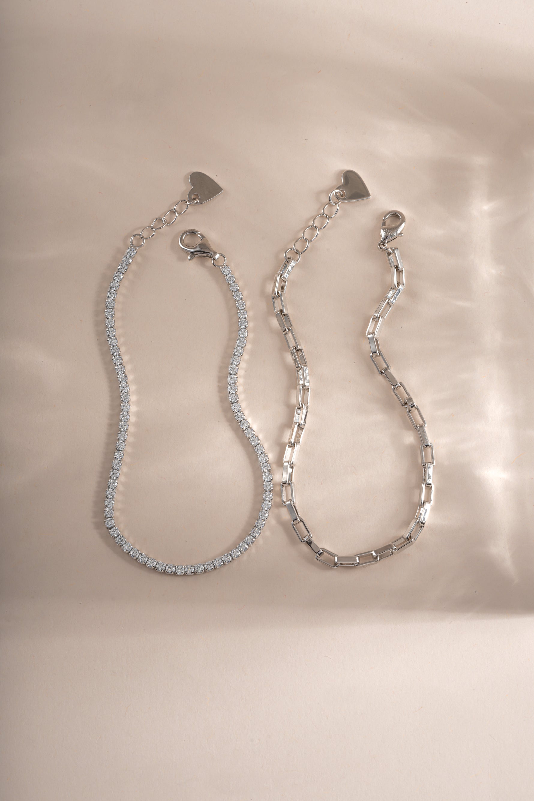 Sterling silver tennis and paperclip bracelet set from Sami Jewels featuring sleek, modern jewelry design.