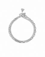 Sterling silver tennis and paperclip bracelet set by Sami Jewels displayed on a white background.