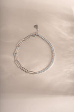 Sterling silver tennis and paperclip bracelet by Sami Jewels displayed flat with detailed chain links and clasp.
