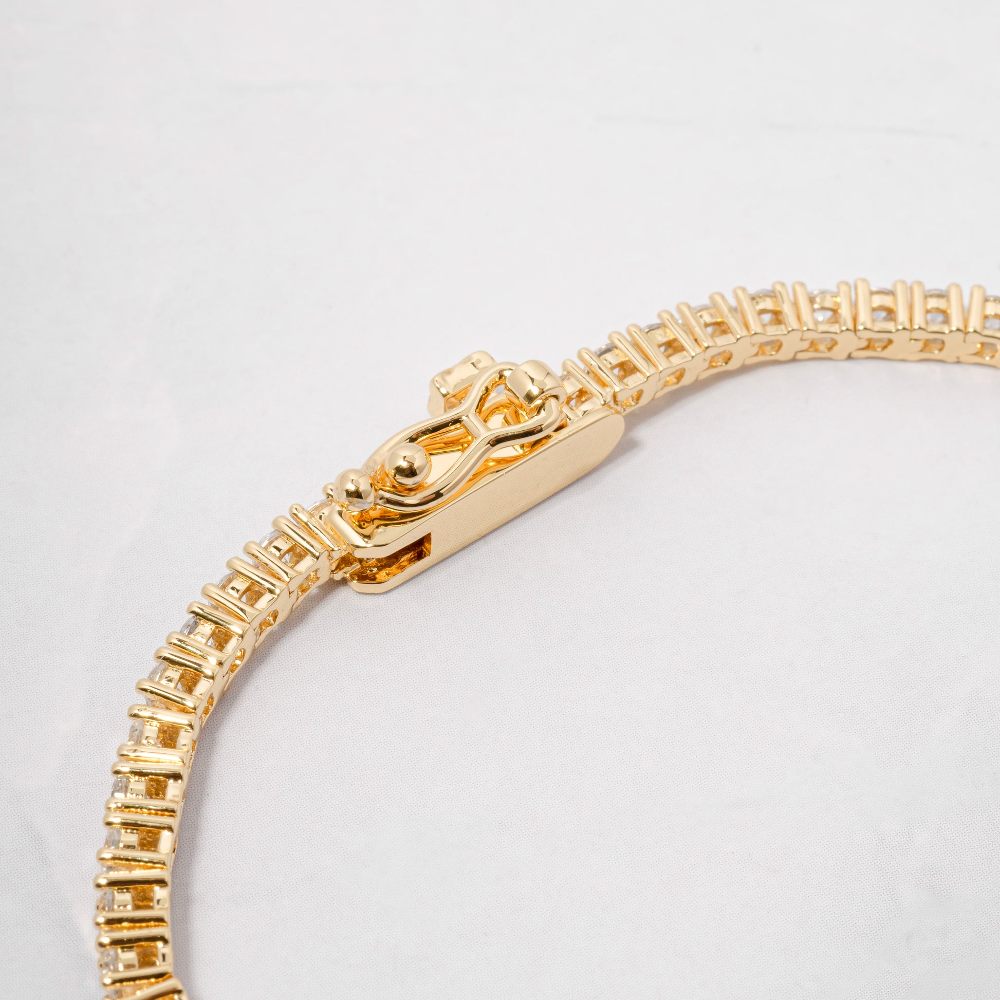 luxury gold tennis bracelet latch