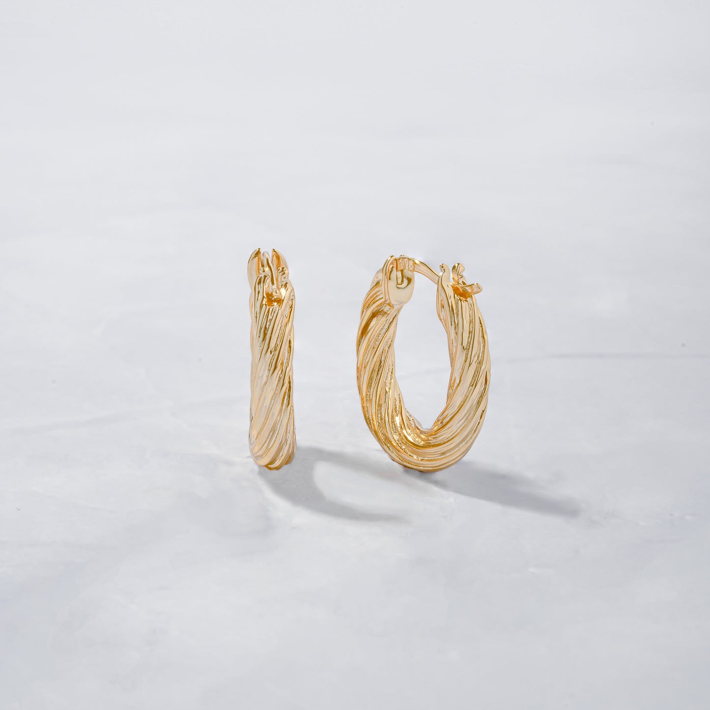textured oval gold hoops