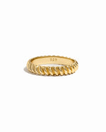 Gold textured stacking ring from Sami Jewels with a detailed, hammered surface on a white background.
