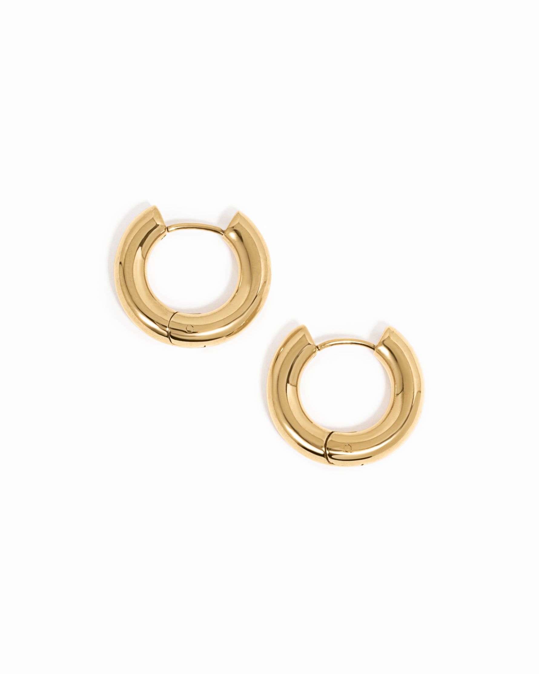 Gold stainless steel SS hoops earrings by Sami Jewels featuring thick huggie design, waterproof and stylish for everyday wear.