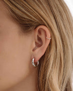 Silver stainless steel SS hoops earrings by Sami Jewels, thick huggie design, waterproof and stylish for everyday wear.
