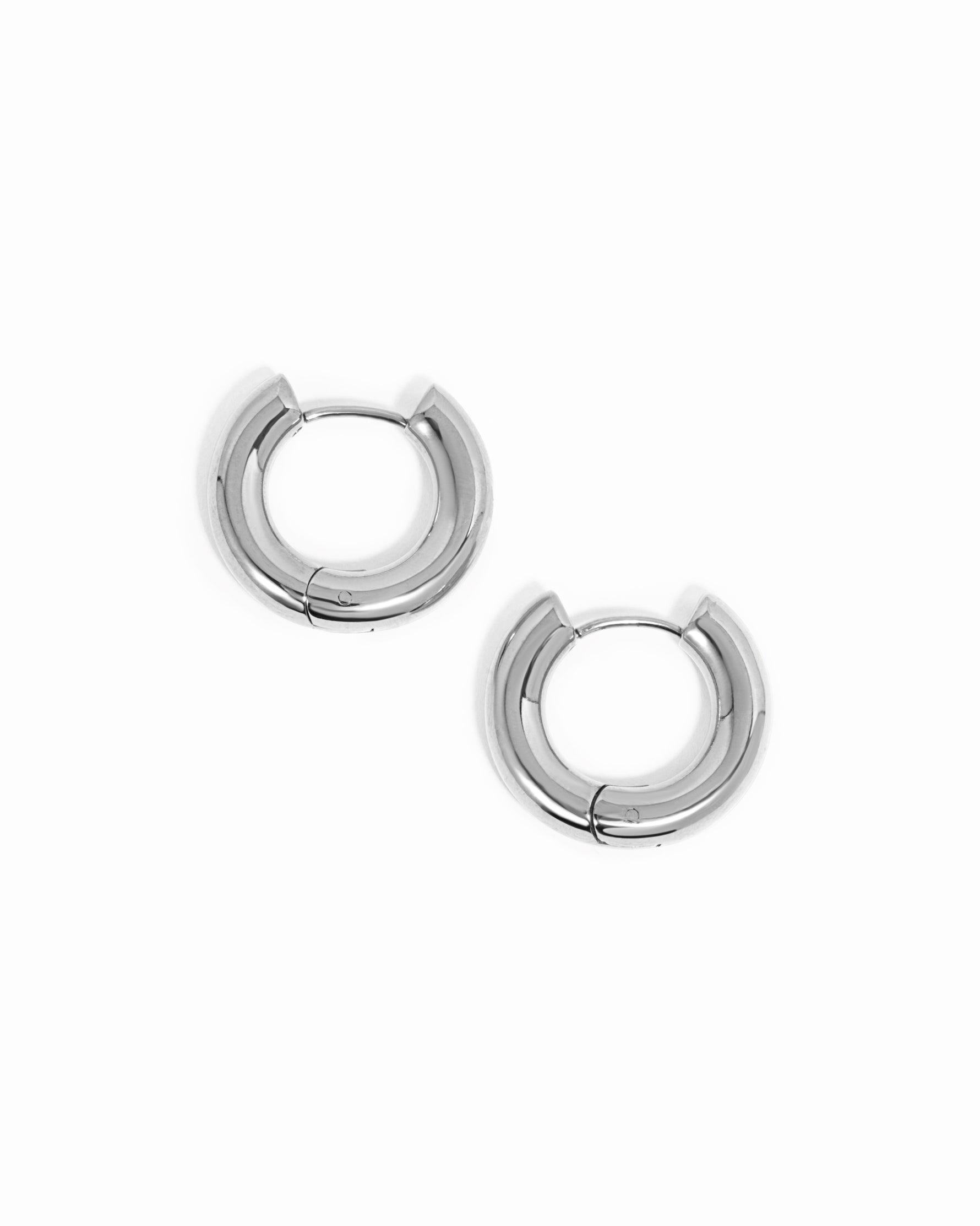 Silver stainless steel SS hoops earrings by Sami Jewels featuring thick huggie-style design and waterproof finish.