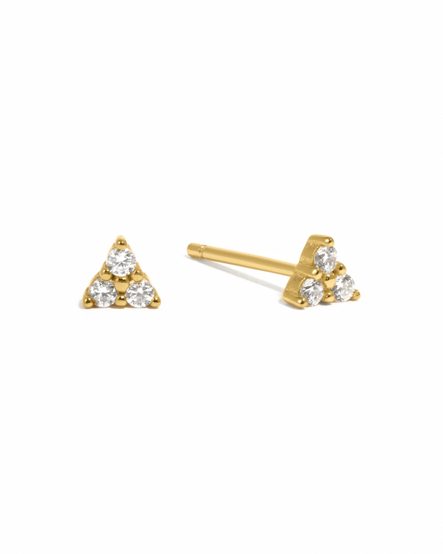 Gold Tiny CZ 3 Stone Stud Earrings from Sami Jewels displayed on a white background.
