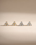 Sterling silver and gold three-stone CZ stud earrings by Sami Jewels featuring sparkling cubic zirconia stones.