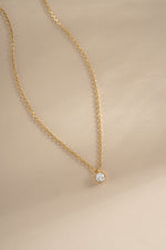 Gold Tiny Bezel Pendant Necklace from Sami Jewels featuring a delicate bezel setting on a fine chain.