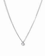 Sterling silver Tiny Bezel Pendant Necklace by Sami Jewels featuring a small bezel setting on a delicate chain.