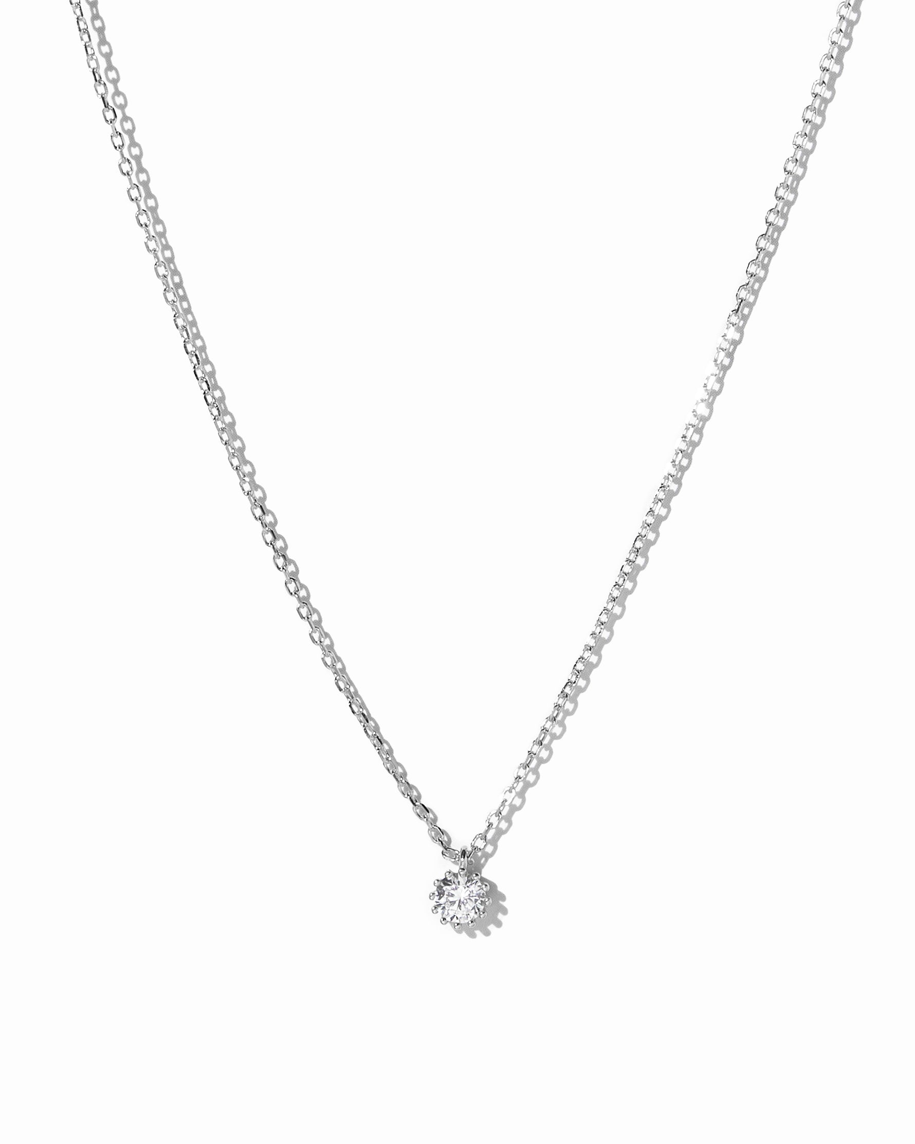 Sterling silver Tiny Bezel Pendant Necklace by Sami Jewels featuring a small bezel setting on a delicate chain.