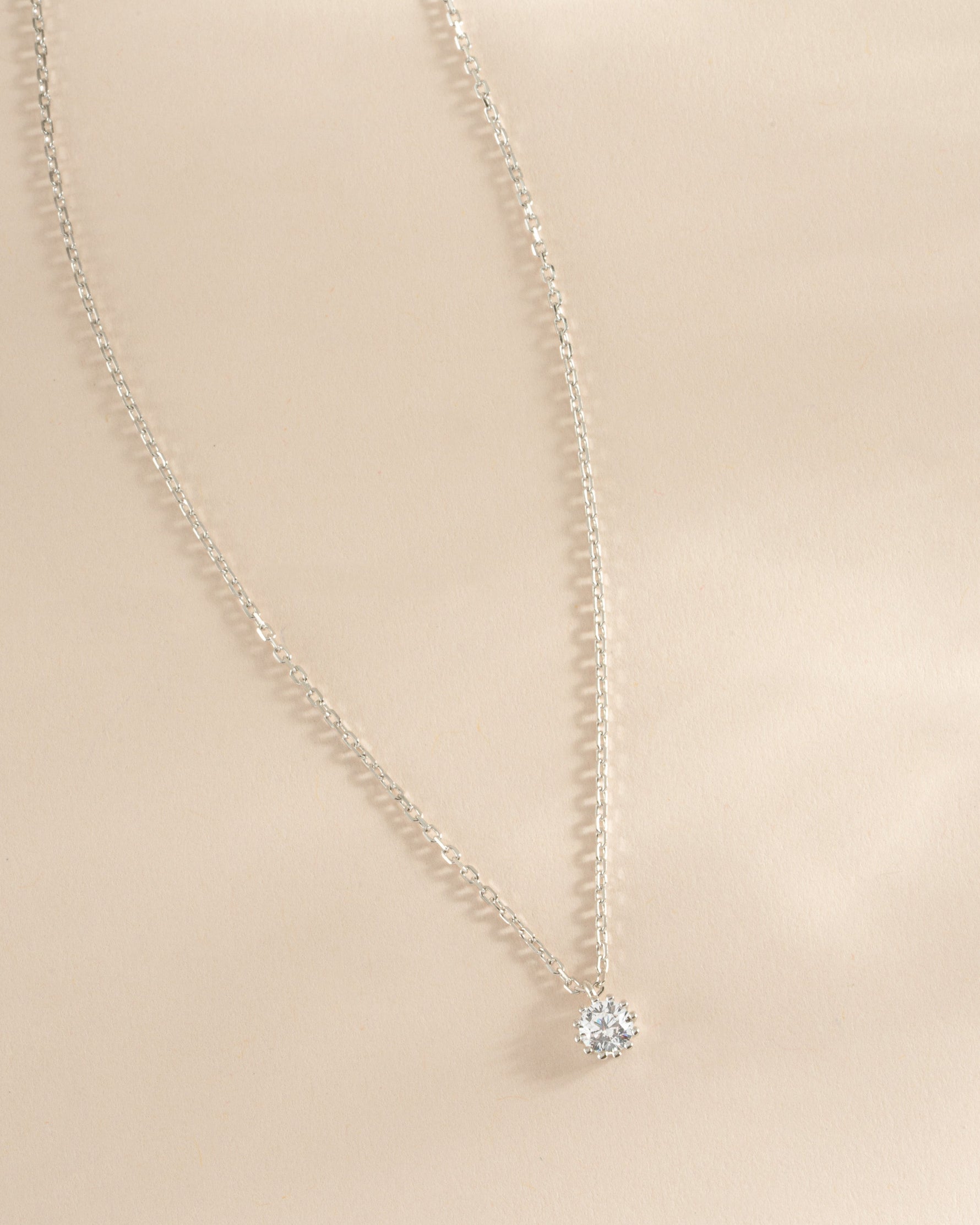 Sterling silver Tiny Bezel Pendant Necklace by Sami Jewels featuring a minimalist bezel setting on a delicate chain.