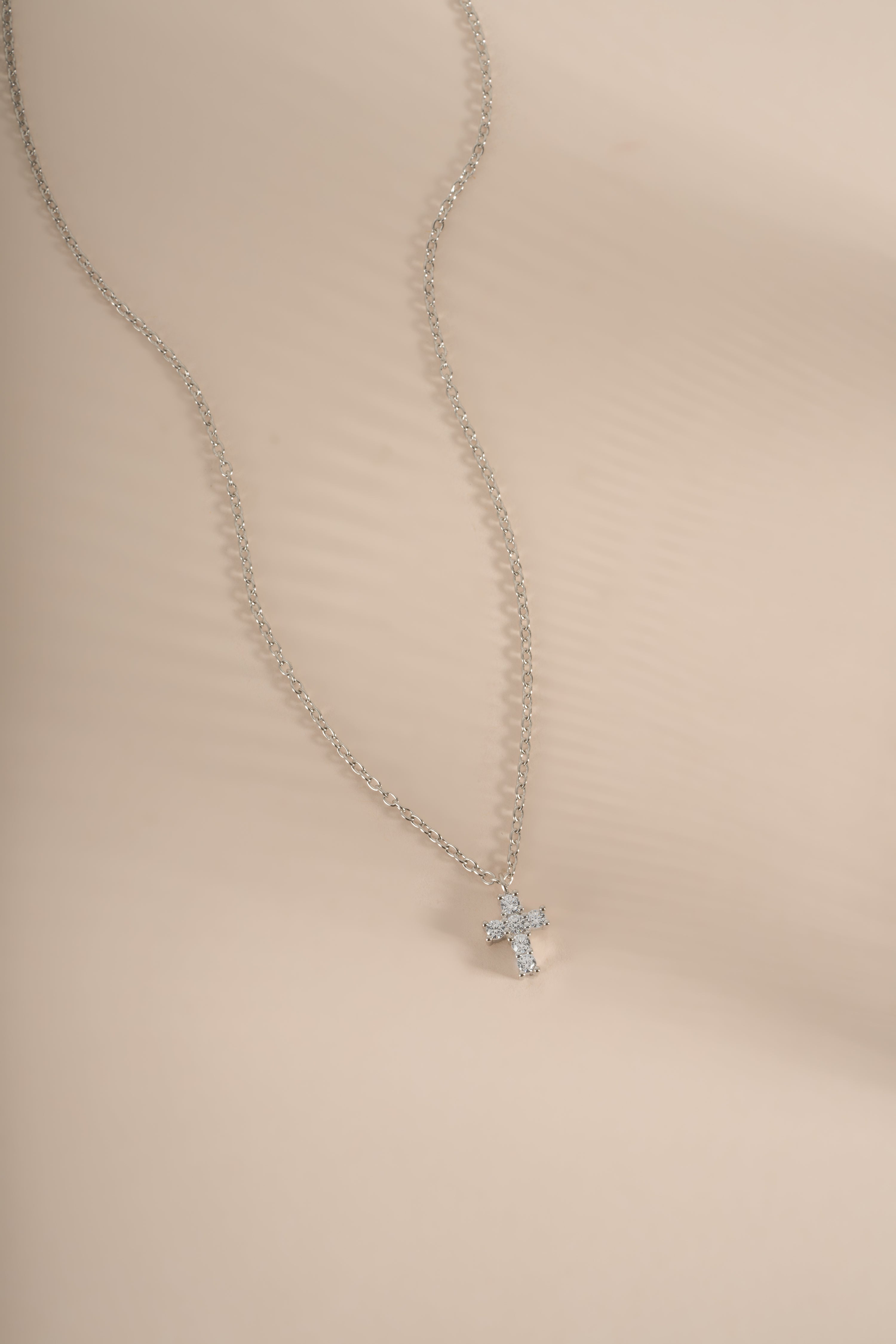 THE CRIMIE STONE CROSS SILVER NECKLACE
