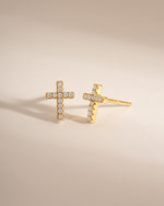 Gold Tiny Cross Stud Earrings by Sami Jewels, angled view showing small cross design and stud backing.