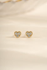 Gold Tiny Heart CZ Stud Earrings by Sami Jewels, front view showing small heart-shaped cubic zirconia studs.