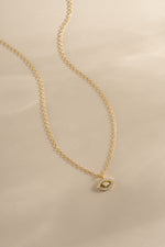 Gold Tiny Evil Eye Necklace by Sami Jewels, front view showing delicate evil eye pendant on a fine chain.