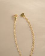 Gold Tiny Evil Eye Necklace from Sami Jewels with lobster clasp closure, featuring a small evil eye pendant on a delicate chain.