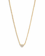 Gold Tiny Heart Necklace by Sami Jewels, delicate jewelry with a small heart pendant on a white background.