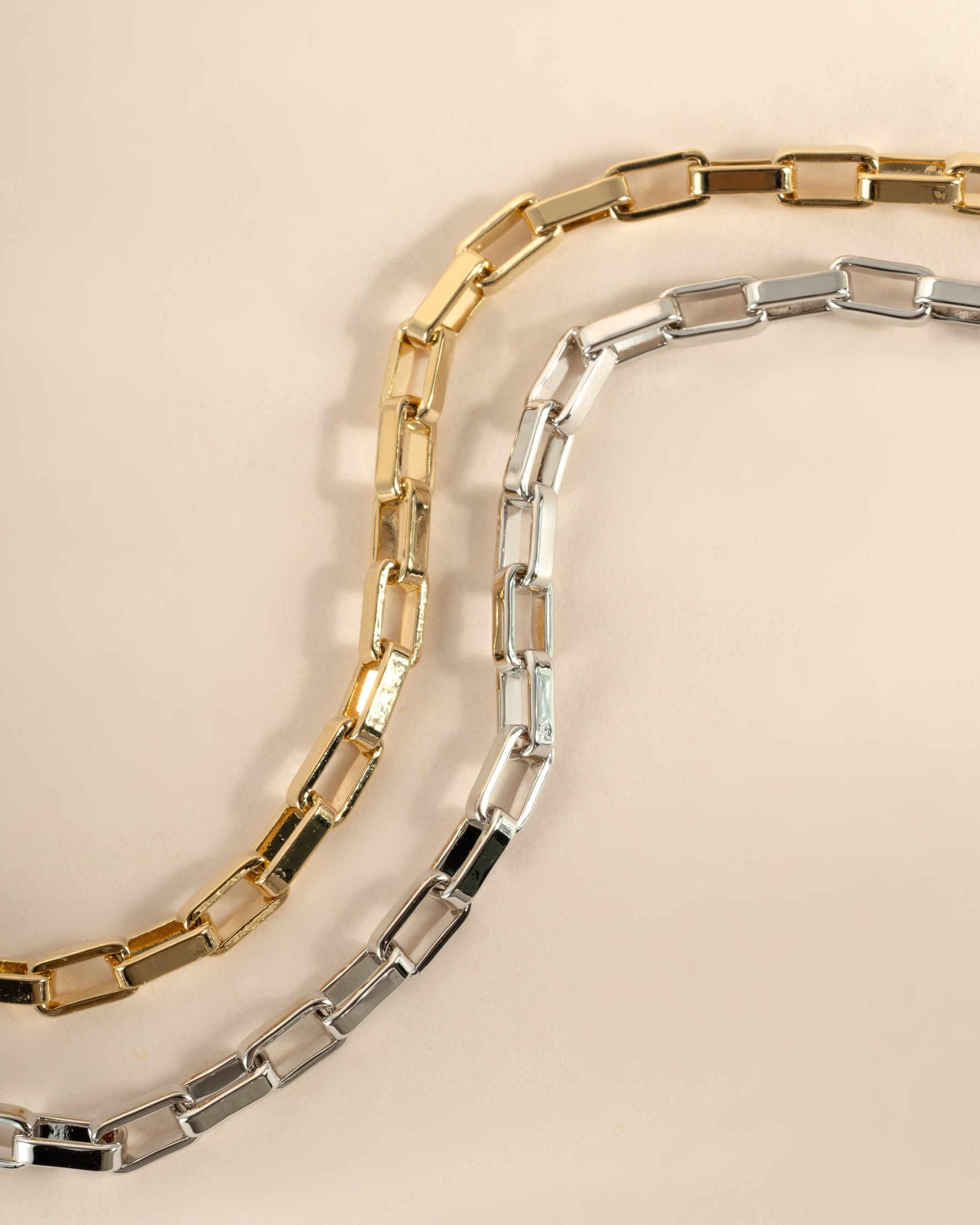 Gold and silver Tiny Link Paperclip Bracelet by Sami Jewels featuring sleek, minimalist paperclip chain design for everyday wear.