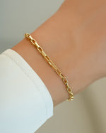 Gold Tiny Link Paperclip Bracelet by Sami Jewels featuring sleek interconnected paperclip chain design.