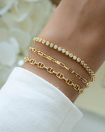 Gold Tiny Link Paperclip Bracelet by Sami Jewels featuring small interconnected paperclip links on a delicate bracelet.