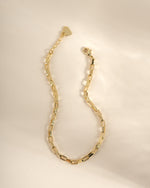 Gold Tiny Link Paperclip Bracelet by Sami Jewels featuring small interconnected paperclip links on a delicate chain.