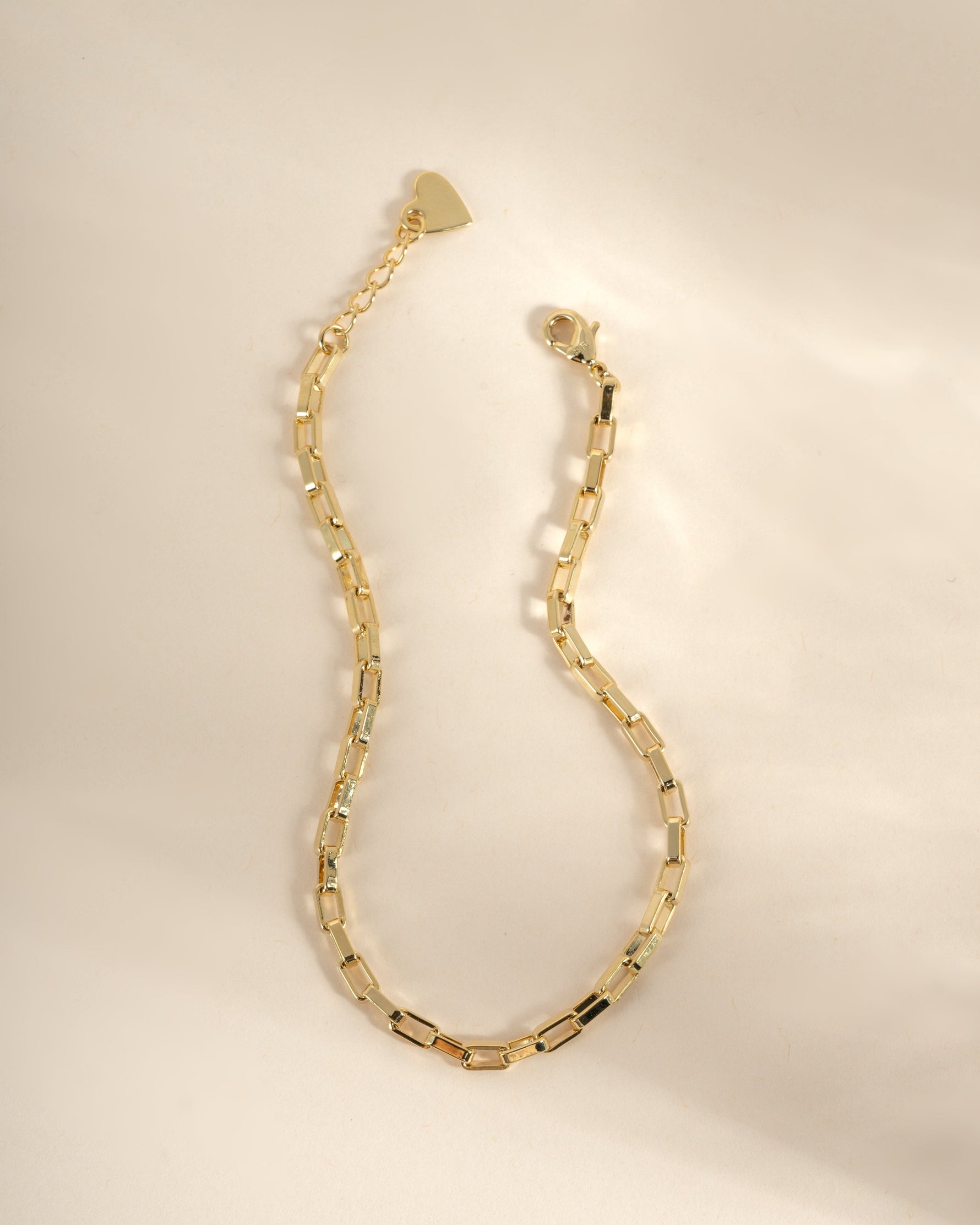 Gold Tiny Link Paperclip Bracelet by Sami Jewels featuring small interconnected paperclip links on a delicate chain.