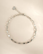 Silver Tiny Link Paperclip Bracelet by Sami Jewels featuring sleek, interconnected paperclip design on a delicate chain.
