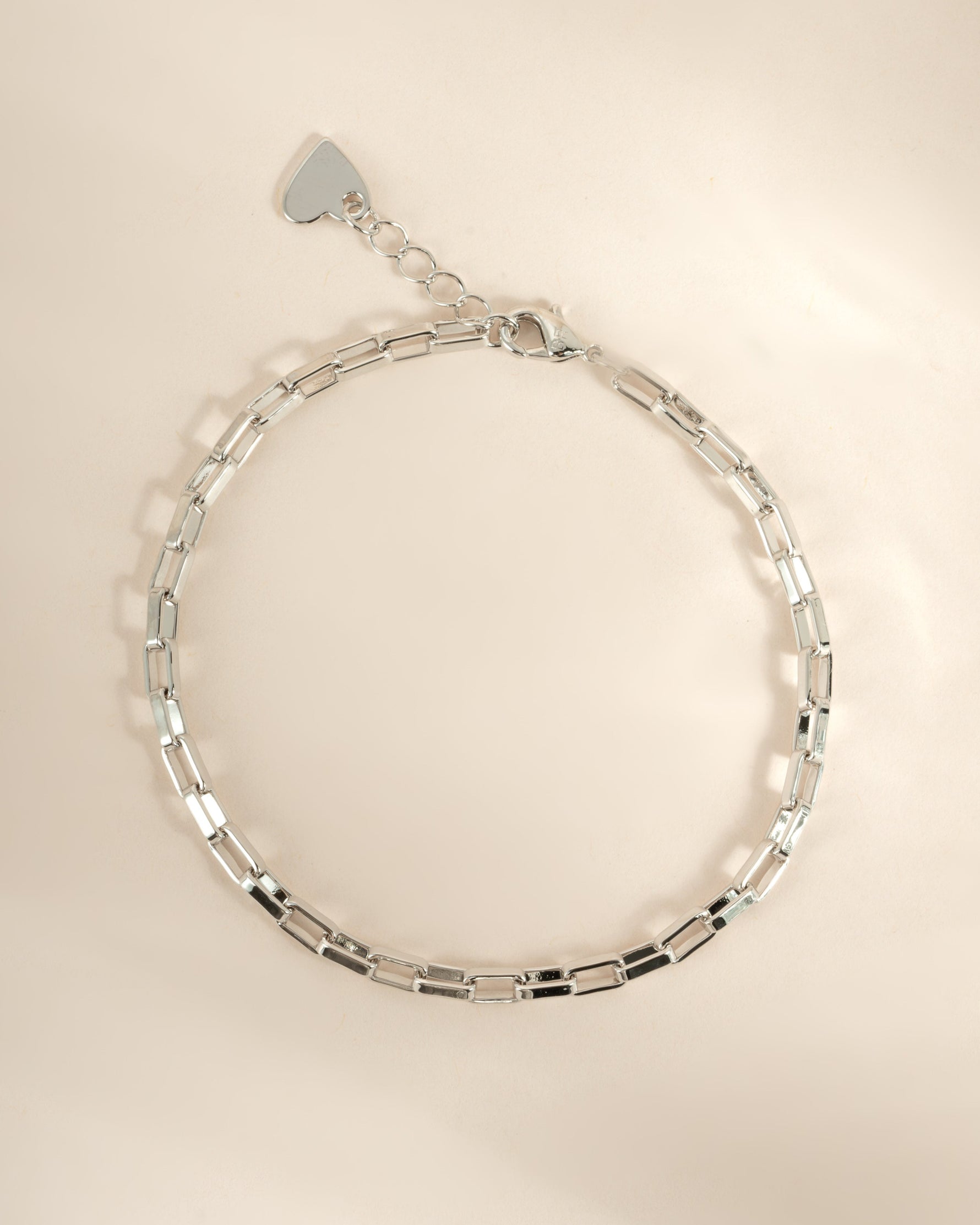Silver Tiny Link Paperclip Bracelet by Sami Jewels featuring sleek, interconnected paperclip design on a delicate chain.
