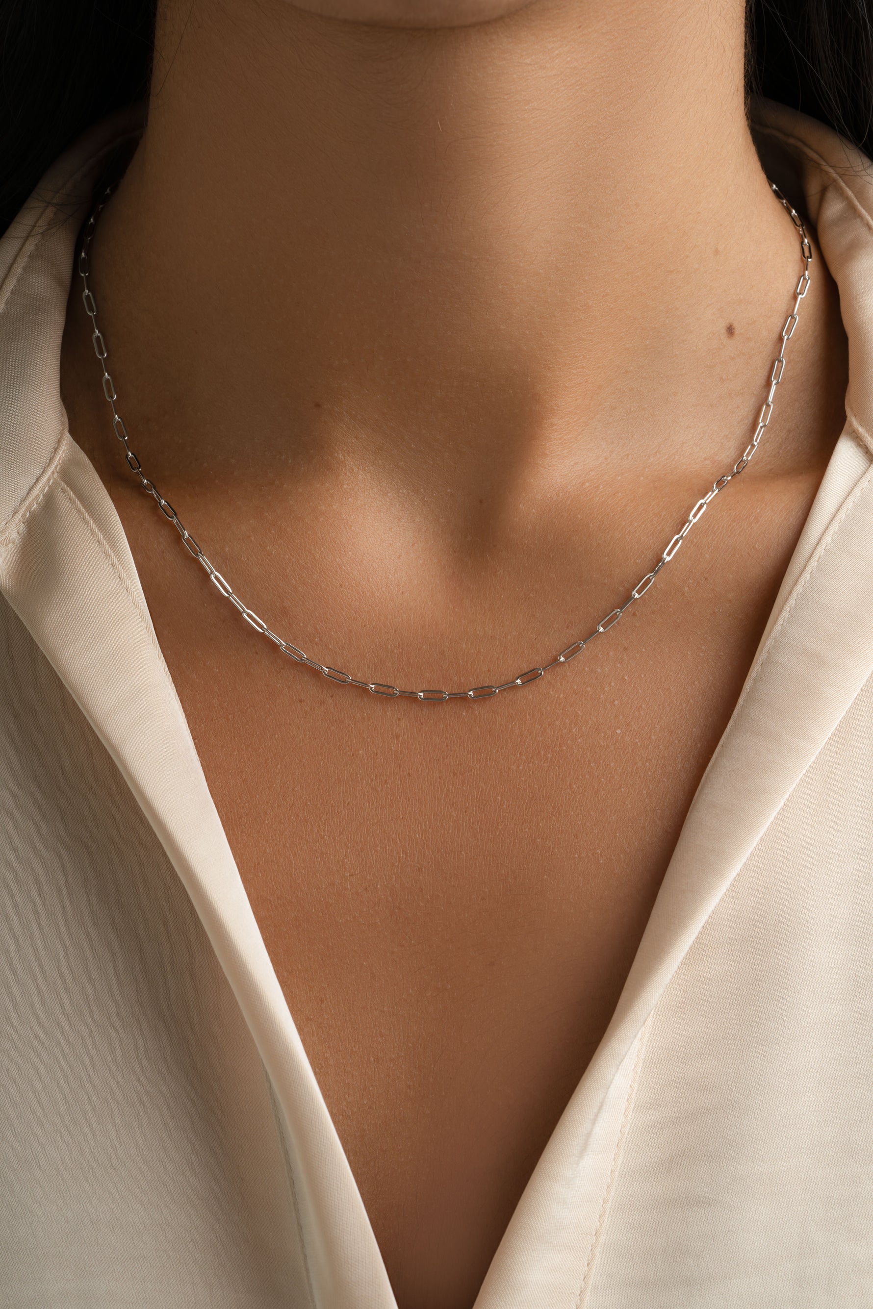 Sterling silver Tiny Link Paperclip Necklace by Sami Jewels featuring sleek, minimalist paperclip chain design.