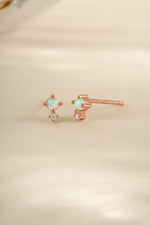 Rose gold Tiny Opal Stud Earrings by Sami Jewels featuring small, sparkling opal gemstones on delicate earring posts.