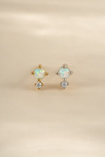 Sterling silver and gold tiny opal stud earrings by Sami Jewels, featuring small, iridescent opal gemstone studs.