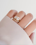 toi et moi matching band set in gold on models hand