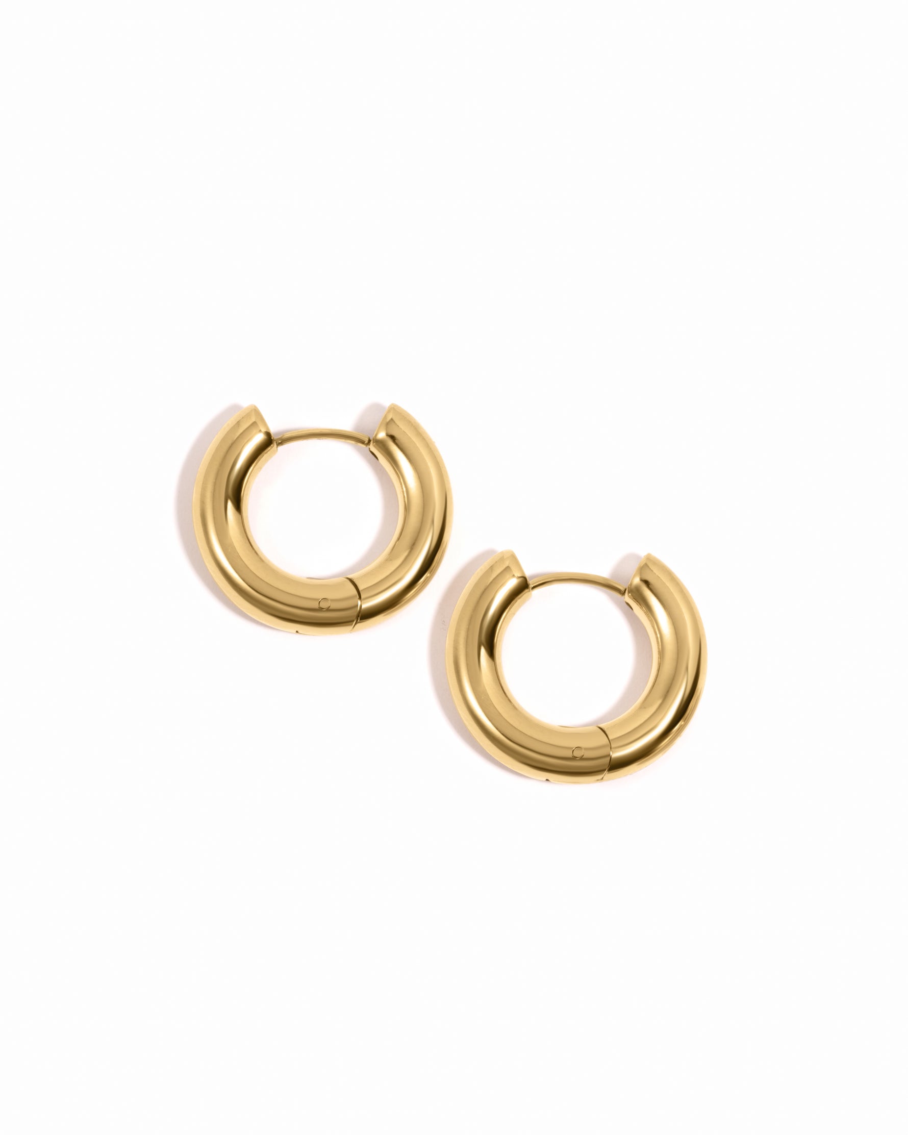 Gold stainless steel SS thick tube hoop earrings by Sami Jewels, waterproof and stylish jewelry accessory.